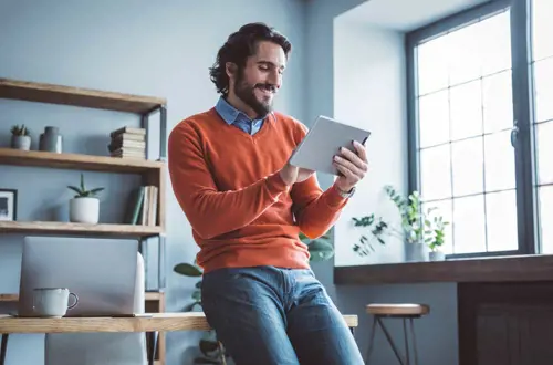 Young Man On Tablet