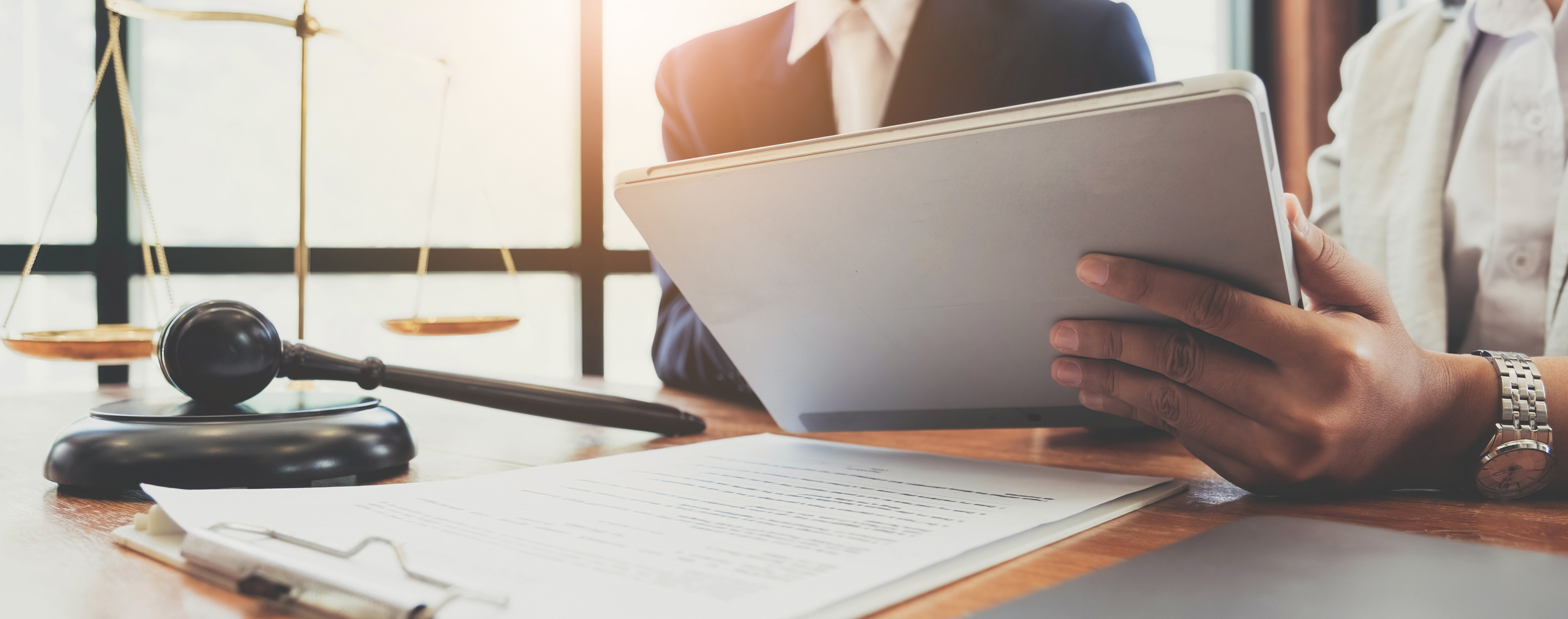 Lawyers Reviewing Documents On Tablet In Office 2026 01 07 00 50 12 Utc