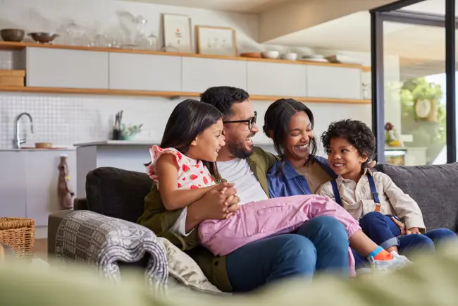 Happy Family Relaxing Together On The Sofa 2026 01 07 06 22 37 Utc